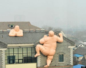 Chinese restaurant owner Li Tsui has been forced to pull down two naked statues of Buddha that are used to advertise his restaurant with the implication that the food was so good even Buddha was coming down from heaven to try some of the dishes.  According to Chinese legend Buddha was once so attracted by the smell of a dish of food that he climbed up a wall and then jumped down on the other side so he could try the food. Recreating the tale of the drawn statues Li claimed that his food was also so good that if Buddha was around him and also climb the wall to get to it.  But the giant naked statues in the city of Jinan in east China’s Shandong province offended Buddhists who said using the image to advertise a restaurant was offensive.  Li said: "I didn't intend to offend anyone and in fact there is a very popular dish that we also make here known as Fotiaoqiang, which is extremely popular in this part of the world and everybody eats it. The dish translates as "Buddha leaps off the wall". I simply meant to advertise that and as everybody knows the dish didn't think that would be a problem."  Fotiaoqiang is made with the main ingredients of chicken and duck. But while it is served in many restaurants in the region taking it a stage further with a giant naked Buddha was for most people in the religion a step too far.  After protests outside the restaurant to urge people not to go inside and local media coverage the restaurant backed down – and the two Buddha statues have been removed just two days after they were put in place.