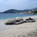 "Triple bunker" by Elian Stefa, Gyler Mydyti (Concrete Mushrooms Project) [CC BY-SA 3.0 (http://creativecommons.org/licenses/by-sa/3.0)], via Wikimedia Commons